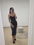 Vestido de Lunares Midi Negro